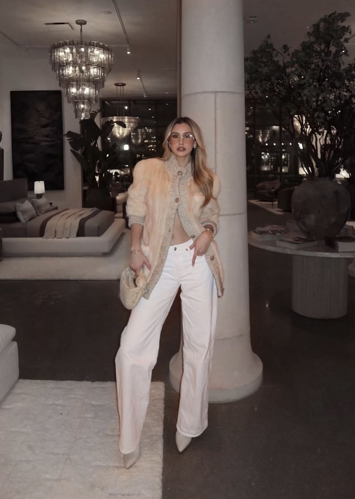 Fur cardigan with white wide-leg jeans